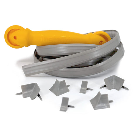 InstaTrim project kit in grey with flexible trim spool, applicator tool, and corner and end caps for clean edging